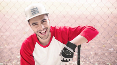 Handsome Guy Wearing a Hat in Stop Motion While Holding a Baseball Bat on His Hands a13679
