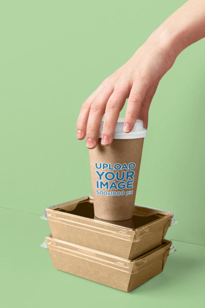 Mockup of a Paper Cup Placed on Top of Some Containers m29032 r-el2
