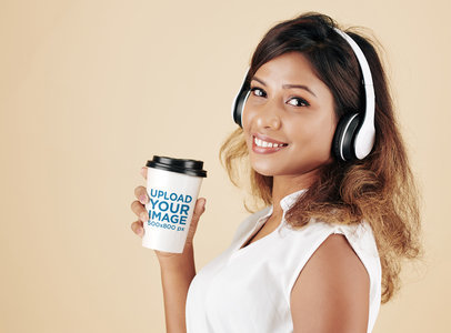 Mockup of a Woman Holding a Paper Cup m29279 r-el2
