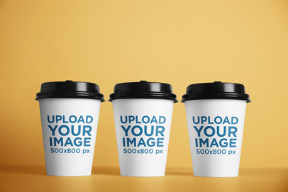Mockup of Three Paper Cups Aligned Next to Each Other m29269 r-el2