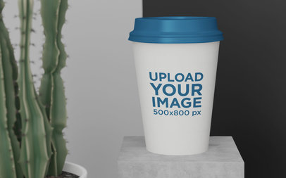 Paper Cup Mockup Featuring a Cactus