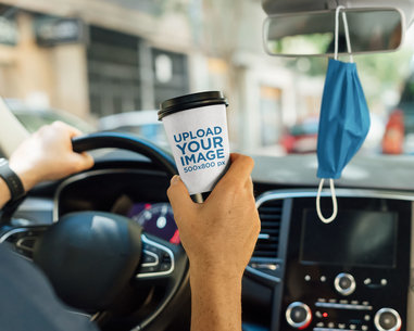 Mockup of a Driver Holding a Coffee Cup