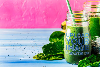 Mockup of a Glass Jar Featuring Green Juice and Spinach  m29267 r-el2