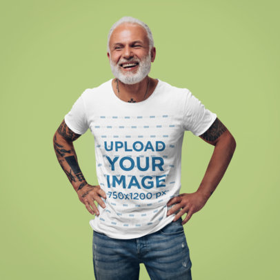 T-Shirt Mockup of a Bearded Senior Man with Arm Tattoos
