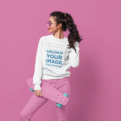 Sweatshirt Mockup Featuring a Stylish Woman Holding a Skateboard