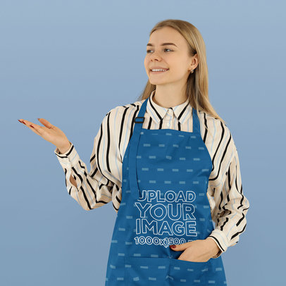 Apron Mockup Featuring a Smiling Woman Waiter Pointing at Something
