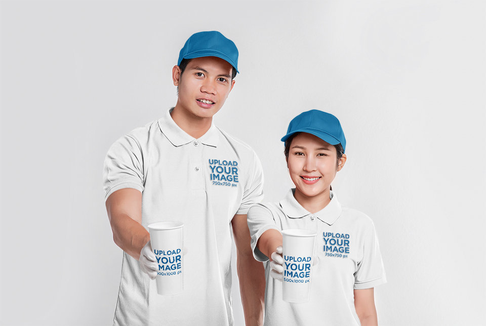 Polo Shirt Mockup of a Man and a Woman Holding Paper Cups