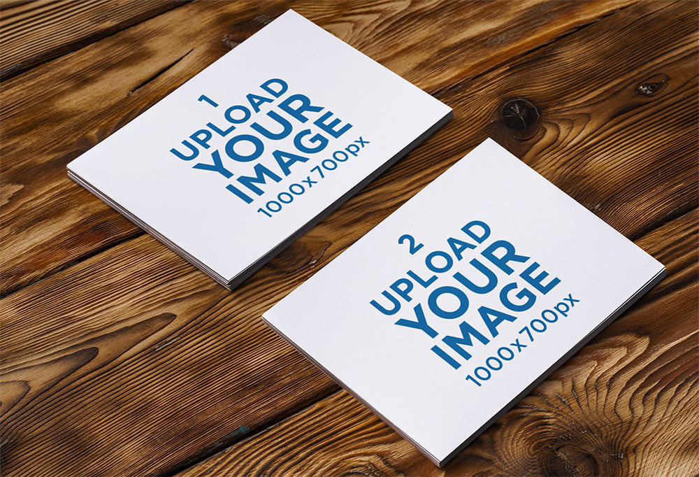 Mockup of Two Horizontal Flyers Placed over a Wooden Surface