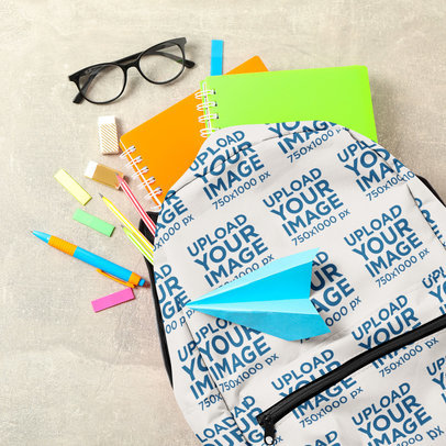 Mockup of a Backpack Placed on the Floor With School Supplies m28741 r-el2