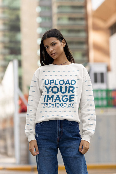 Sweatshirt Mockup of a Serious Woman Posing in the City