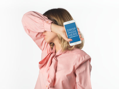 Blonde Woman Holding an iPhone Mockup Covering Her Face a19289