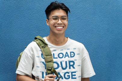 Round-Neck Tee Mockup Featuring a Smiling Man with Glasses