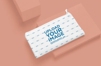 Mockup of a Simple Pouch Mockup Featuring a Colorful Surface