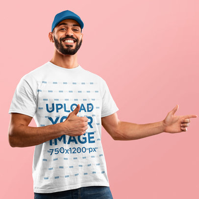 T-Shirt Mockup of a Happy Bearded Man Pointing at Something