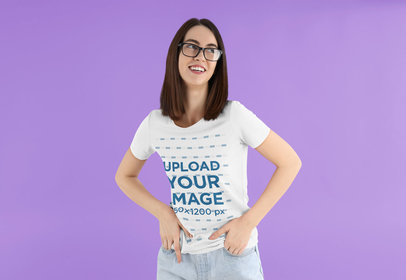 T-Shirt Mockup Featuring a Smiling Woman Posing Against a Colorful Background