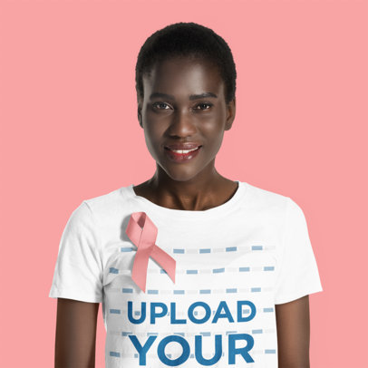 Tee Mockup of a Woman with Short Hair Wearing a Ribbon in Support of Cancer Awareness Month
