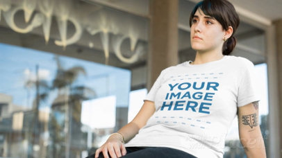 Woman Sitting at a Skate Ring Wearing a Round Neck T-Shirt Video