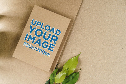 Mockup of a Vertical Flyer Placed by a Bunch of Leaves