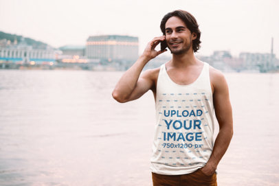 Heathered Tank Top Mockup Featuring a Man Talking on His Smartphone m18171 r-el2