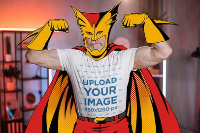 Heathered T-Shirt Mockup Featuring a Strong Senior Man With a Superhero Illustrated Costume