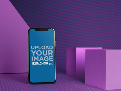 Black iPhone X Mockup in a Textured Room with Shapes a19713