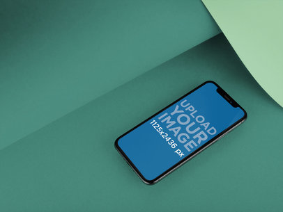 iPhone 11 Pro Template Lying on a Bent Pasteboard