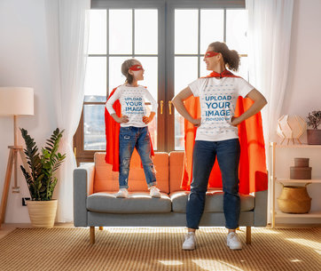 T-Shirt Mockup Featuring a Mother and Her Daughter in Superhero Costumes