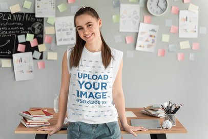 Sleeveless Shirt Mockup Featuring a Woman Leaning Against a Desk