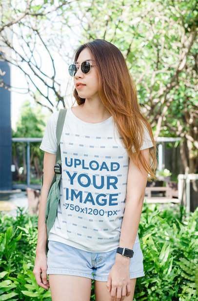 T-Shirt Mockup Featuring a College Student with Sunglasses