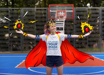 T-Shirt Mockup Featuring a Teenage Girl in an Illustrated Superhero Costume