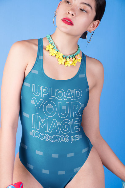 Challenging Woman Wearing a Swimsuit Mockup and a Flowers Necklace