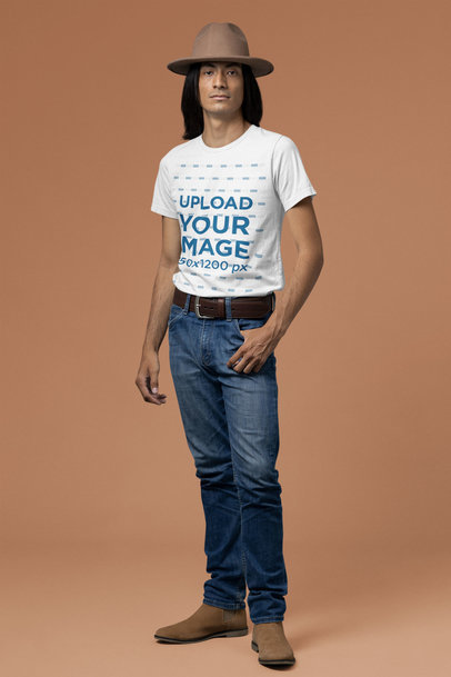 Round-Neck Bella Canvas Tee Mockup of a Man with Long Hair at a Studio