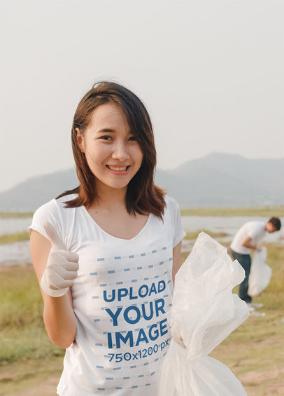 V-Neck T-Shirt Mockup of a Woman Picking Up Trash m17016 r-el2