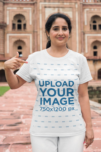 Mockup of a Woman Pointing at Her Rounded-Neck T-Shirt