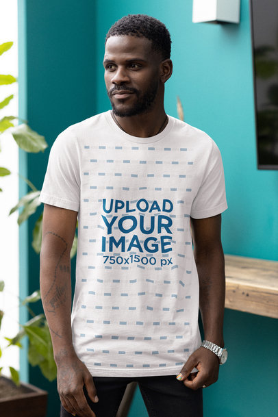 Mockup of a Bearded Man Wearing a Bella Canvas Rounded-Neck T-Shirt