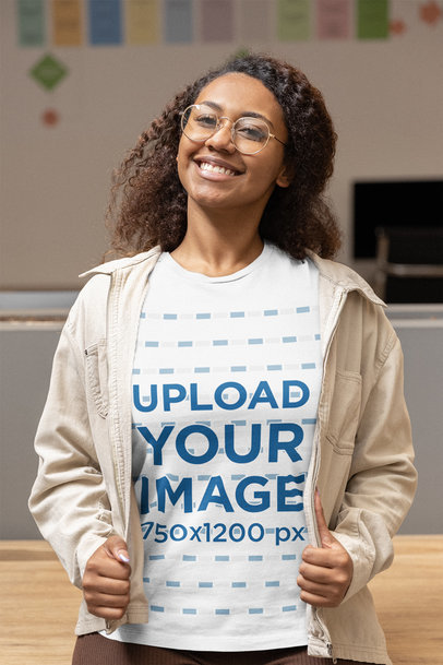 Mockup of a Happy Woman Wearing a Bella Canvas Tee and a Jacket