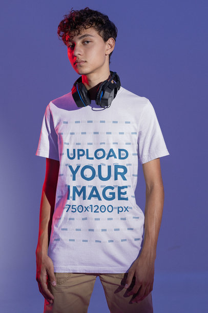 Mockup of a Gamer Wearing a Bella Canvas T-Shirt and Headphones