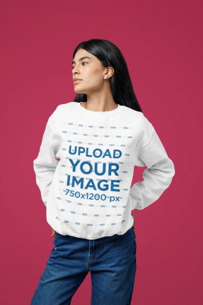 Sweatshirt Mockup Featuring a Serious Woman Wearing Denim Jeans Against a Magenta-Themed Backdrop m29412