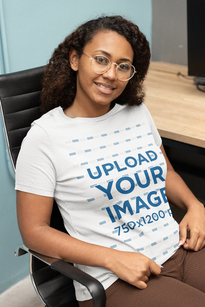 T-Shirt Mockup Featuring a Woman on a Coworking Space m28720