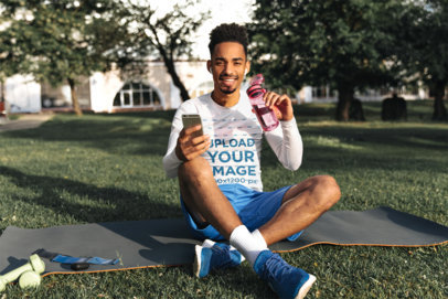 Long Sleeve Tee Mockup Featuring a Man Exercising at a Park