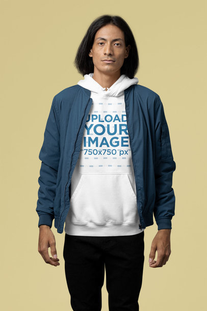 Mockup of a Man with Long Hair Wearing a Pullover Hoodie Under a Bomber Jacket m29400