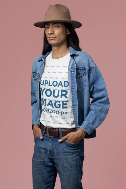 Round-Neck Tee Mockup Featuring a Man with Long Hair in a Studio