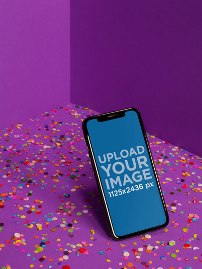 iPhone X Mockup Standing Angled in a Purple Room a19718