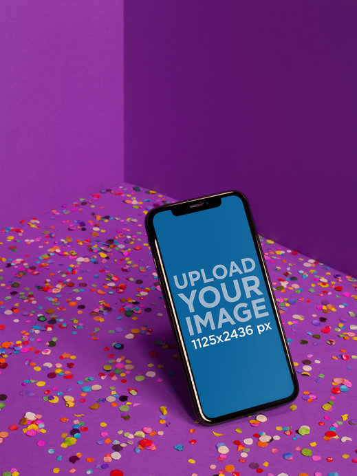 iPhone 11 Pro Mockup Standing Angled in a Purple Room