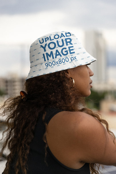 Back-View Mockup Featuring a Woman with Curly Hair Wearing a Bucket Hat