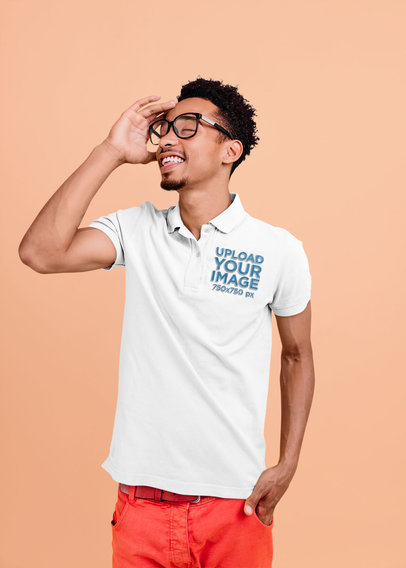 Polo Shirt Mockup Featuring a Man with Glasses at a Studio