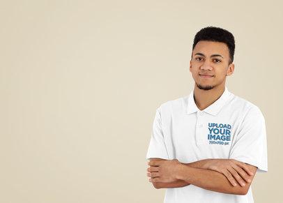 Polo Shirt Mockup Featuring a Serious Man Posing at a Studio