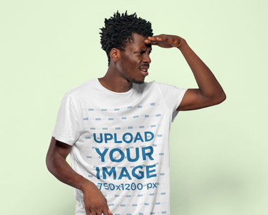 T-Shirt Mockup of a Man with His Hand Above His Eyes in a Searching Pose m26440 r-el2