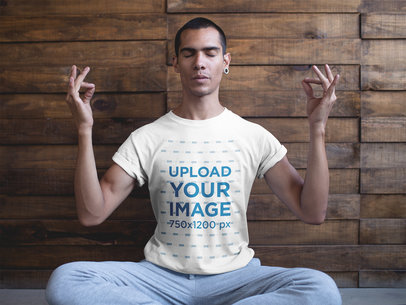 Man in a Seated Mudra Pose Wearing a T-Shirt Mockup a20033
