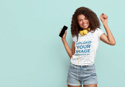 Round-Neck Tee Mockup of a Woman Wearing Headphones Around Her Neck